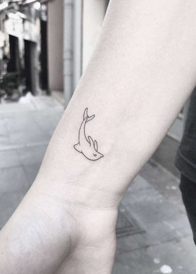 Little Dolphin Tattoo - Tattoonomy